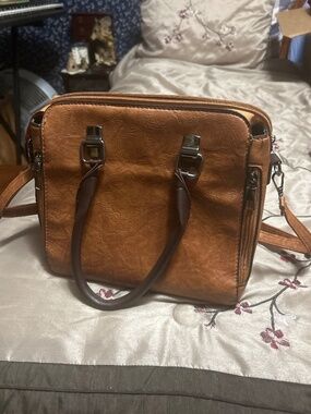 Brown leather purse with strap